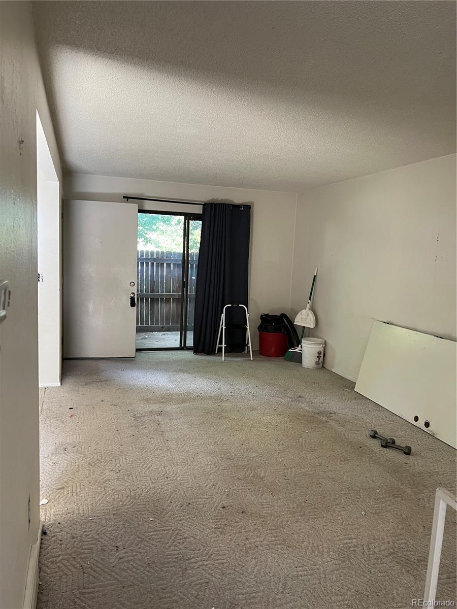 Image 4: Nice sized living room for sectional couch and other creature comforts.