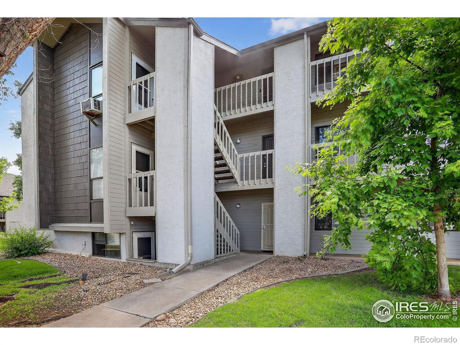 Image 2: Building Front Close Up (Unit is 2nd Floor Center)