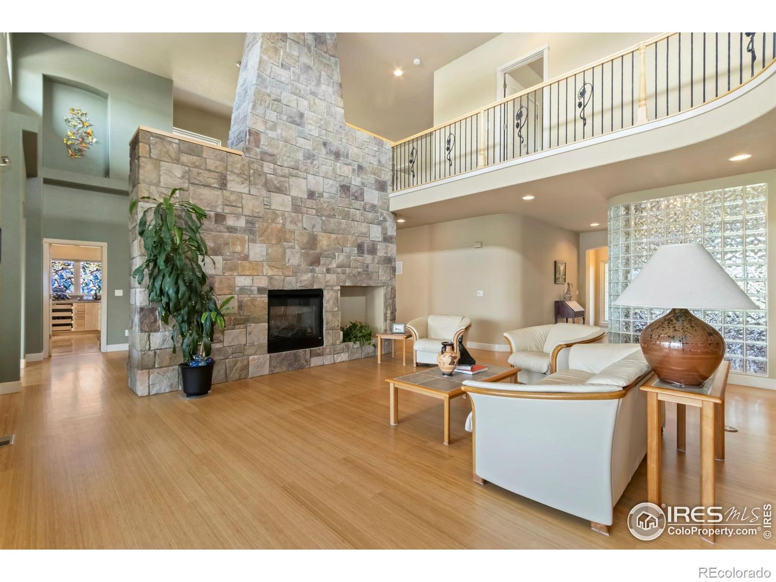 Image 4: Living Room with Stone Fireplace