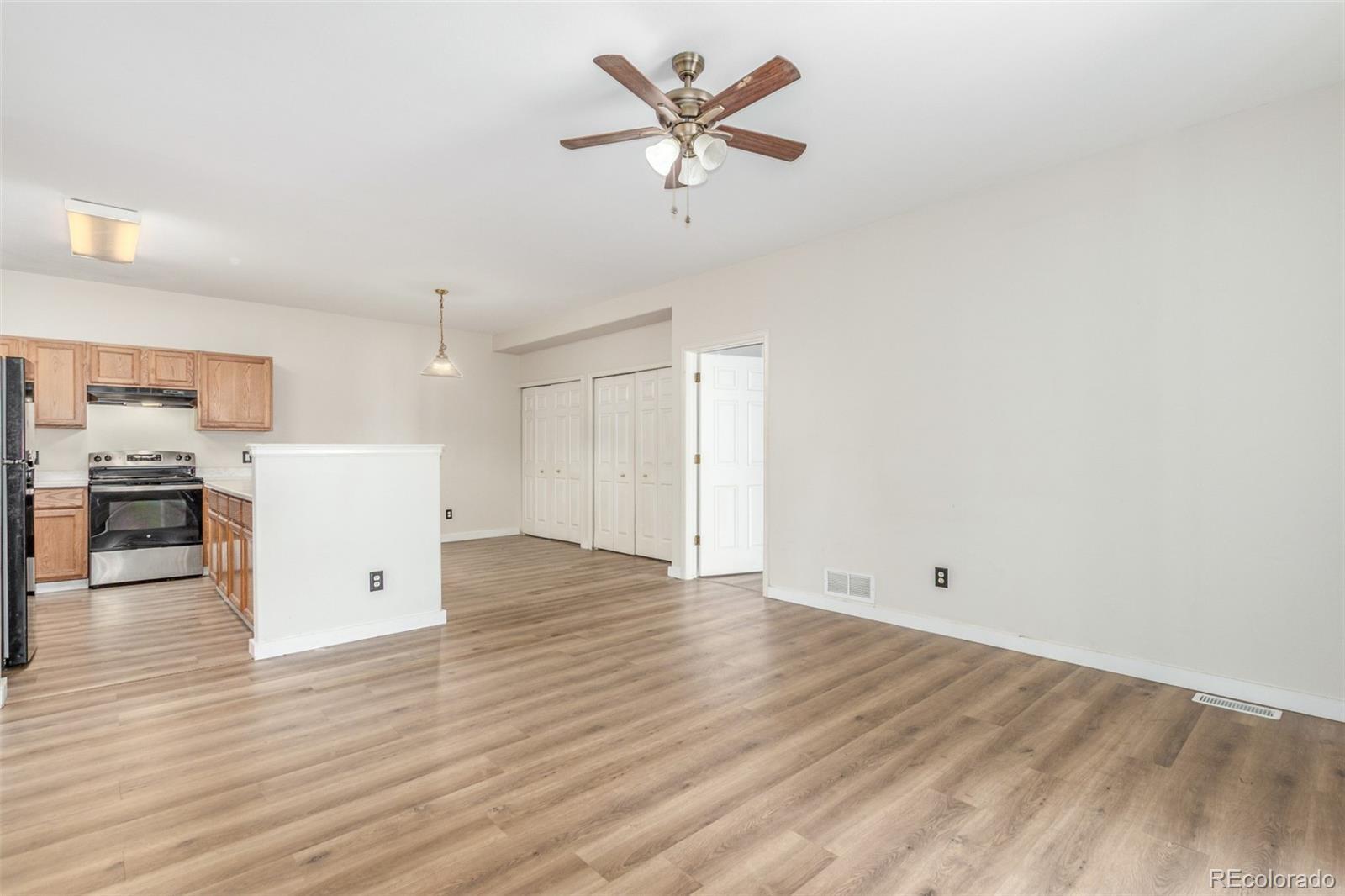 Image 3: Newer floors make this spacious, open 3-Bedroom/2 Bath home shine.