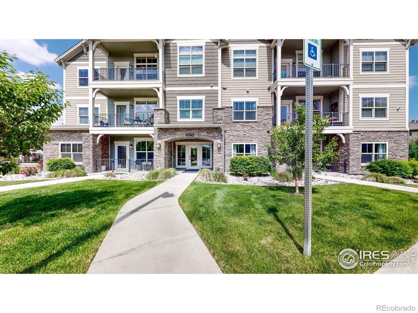 Image 1: main floor unit with private patio.