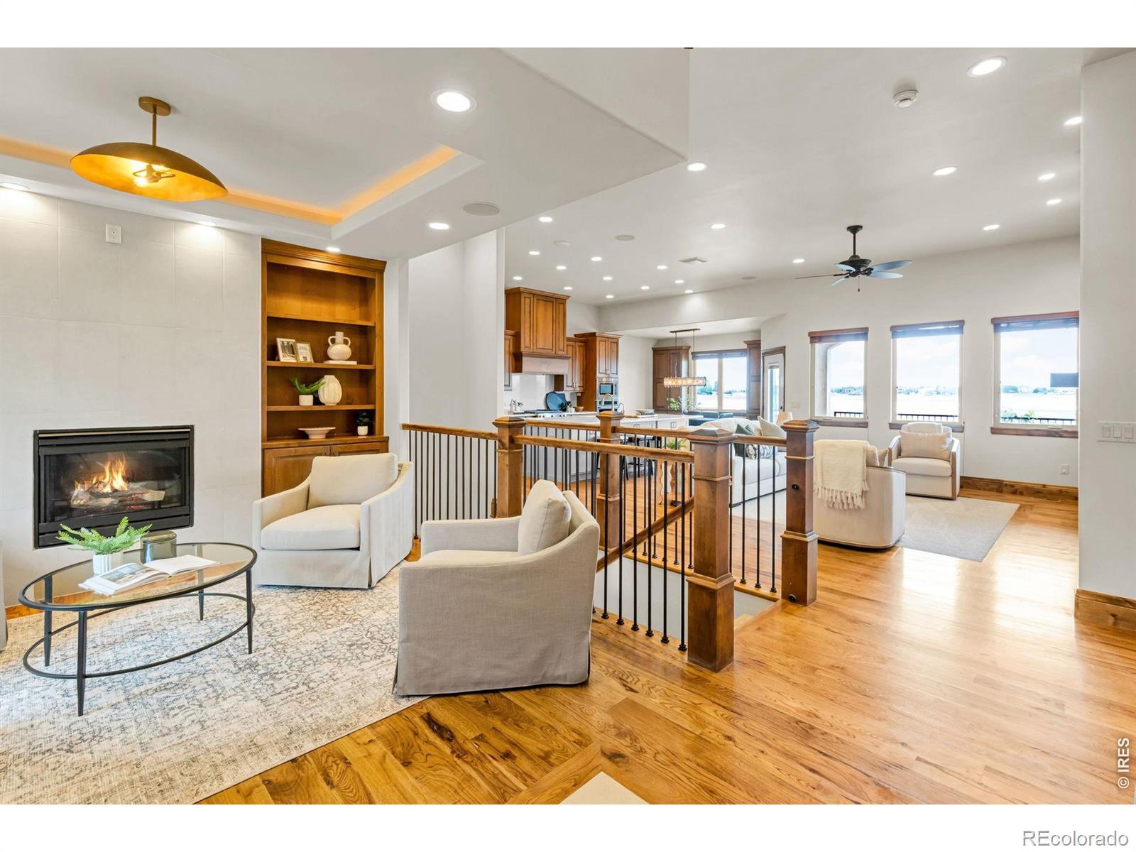 Image 4: When you walk in you immediately soak in the expansive view and the custom floors.