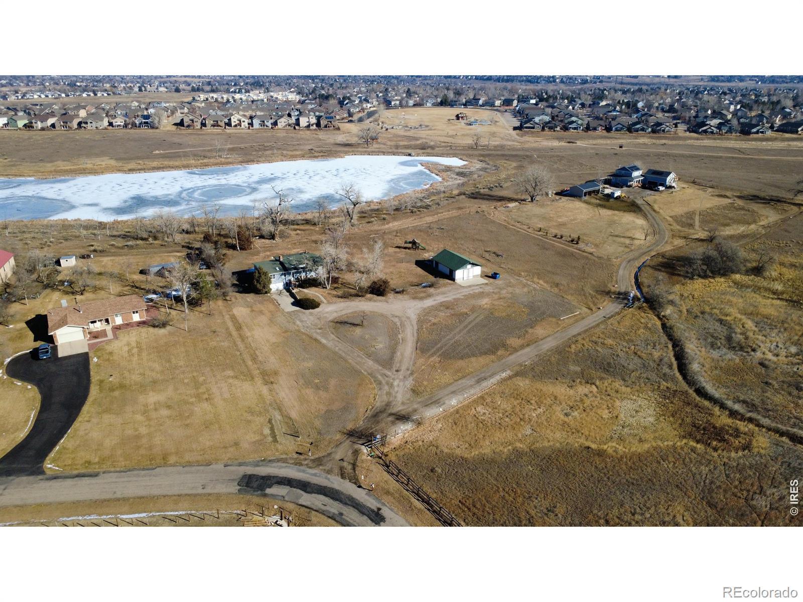 Image 1: Surrounded by nature, this lovely acreage is your getaway without the rural drive time!