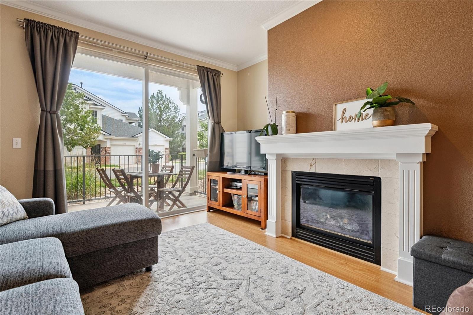 Image 1: Open living room to patio