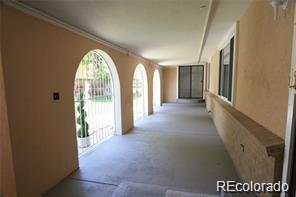 Image 4: Large Covered Front Porch with 2 entrances to the home Image 4: Large Covered Front Porch with 2 entrances to the home