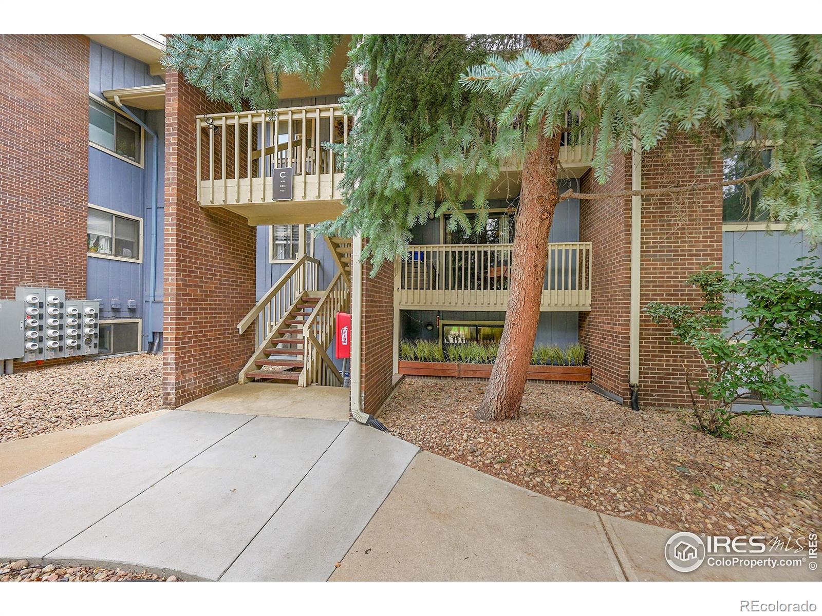 Image 3: Beautifully landscaped grounds with large patio space.