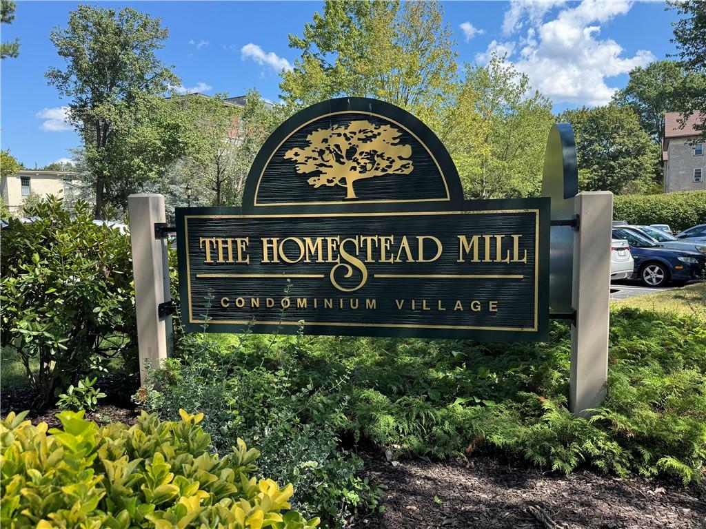 Image 2: Entrance sign to The Homestead Mill Condominium Vi