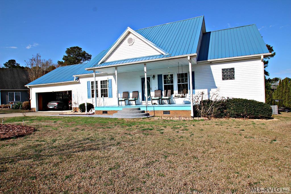 Image 2: Roadside of the Home