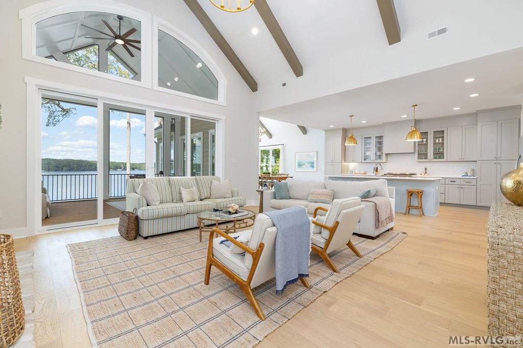 Image 3: Living Leading to Lakefront Porch