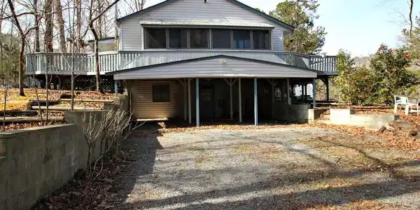 Image 4: Right side of Home with Carport