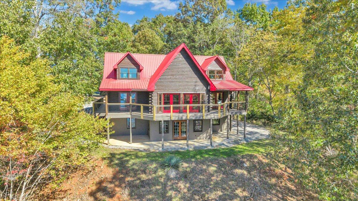Image 1: Waterfront Log Home on Leesville Lake