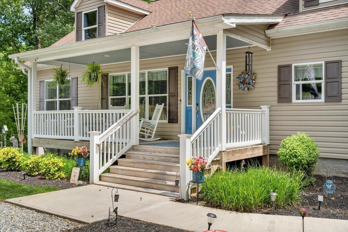 Image 2: Rocking Chair front porch welcomes you!