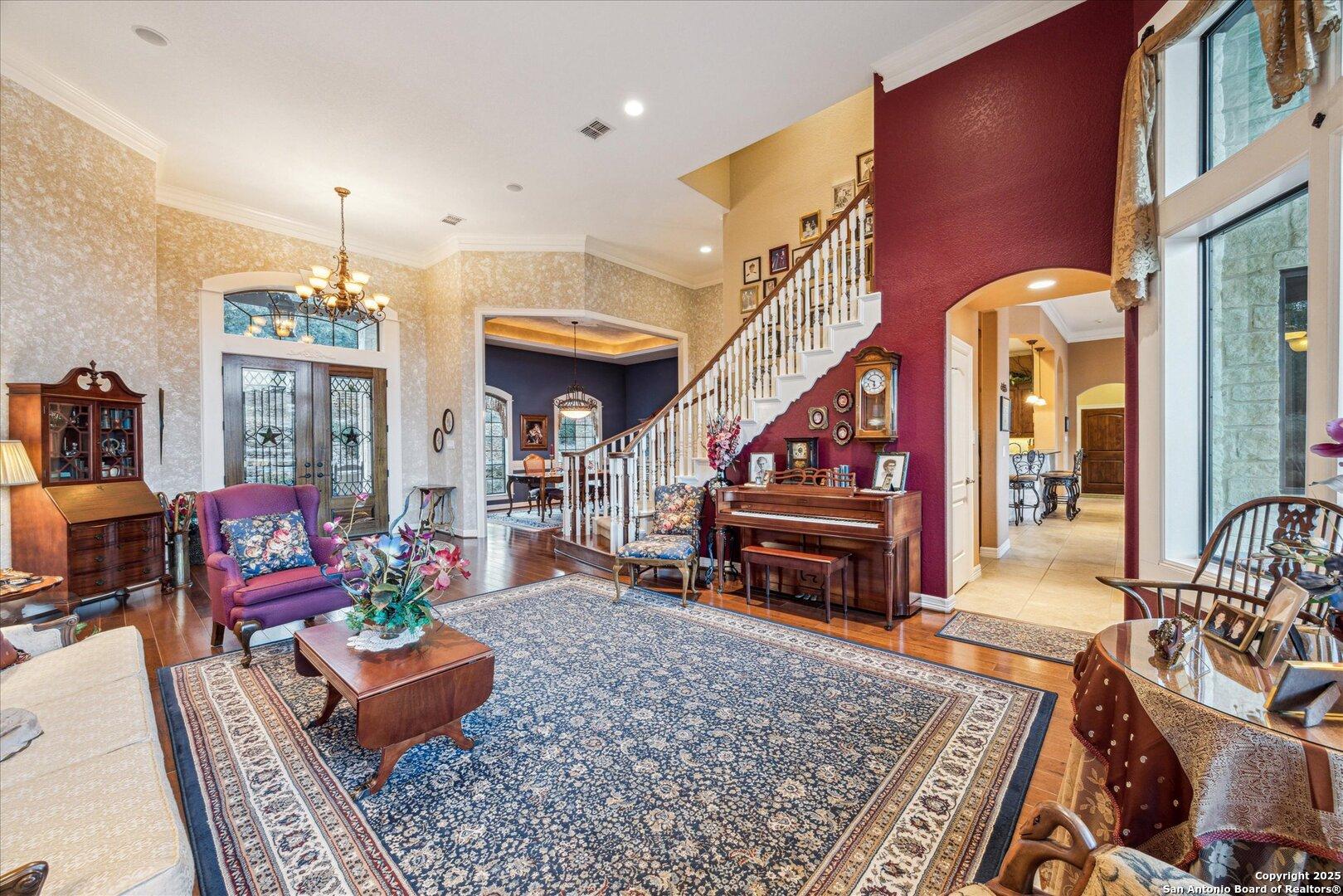 Image 4: Formal living and main entry.