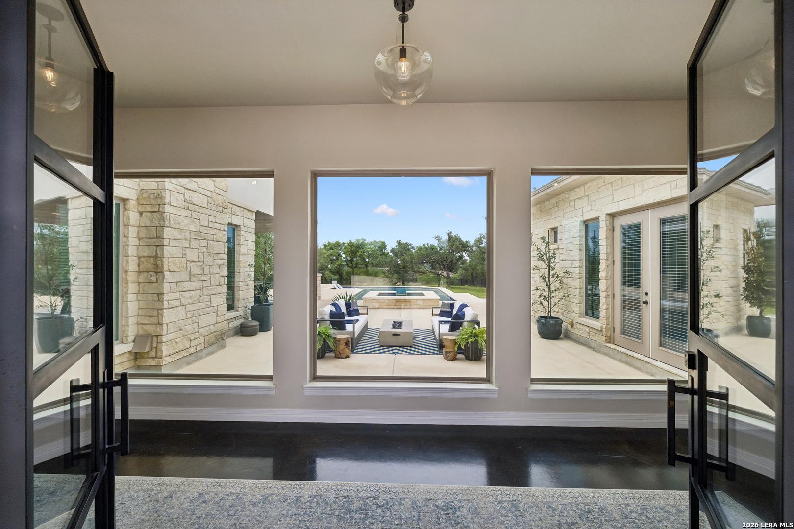 Image 3: Greeted with views of the pool.