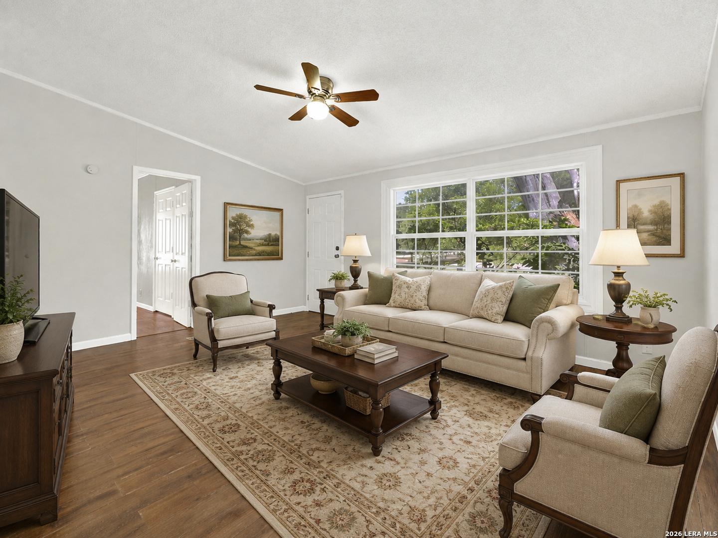 Image 4: Formal living at the front entrance of the home.