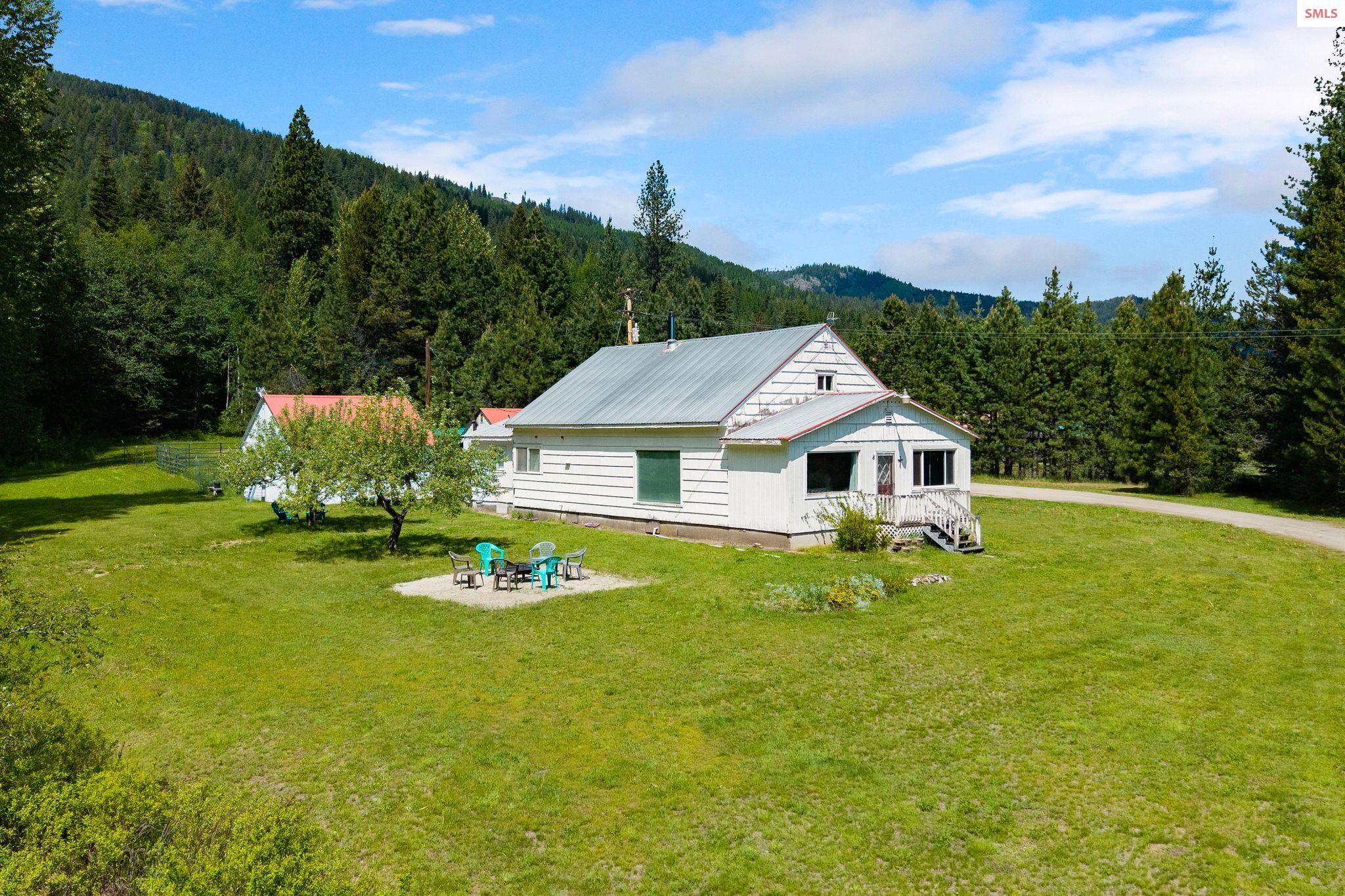 Image 1: Charming home on large acreage.