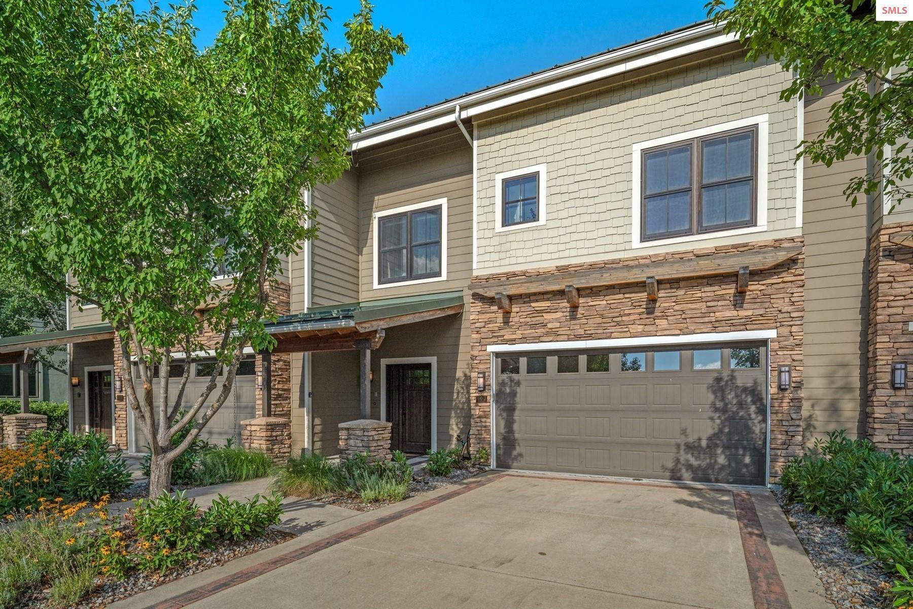 Image 3: This property is 1 of only 8 townhomes with attached 2 car garage, in home elevator & walkout patio