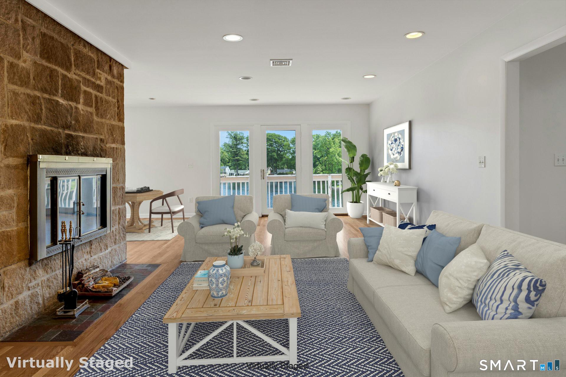 Image 2Living Room: Wood burning fireplace and refinished hw flooring