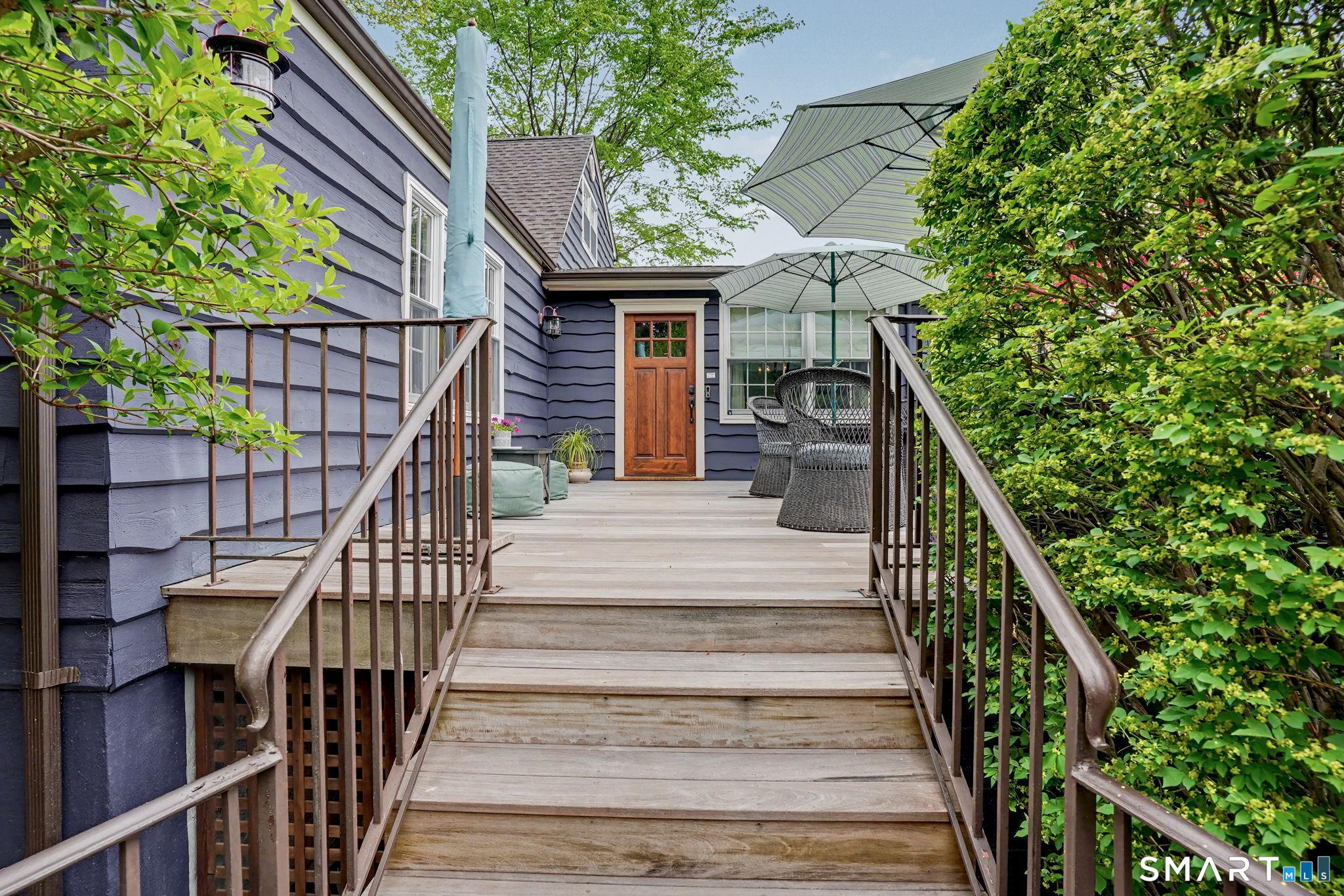 Image 3: Welcome home! Very private spacious deck perfect for relaxing this summer.