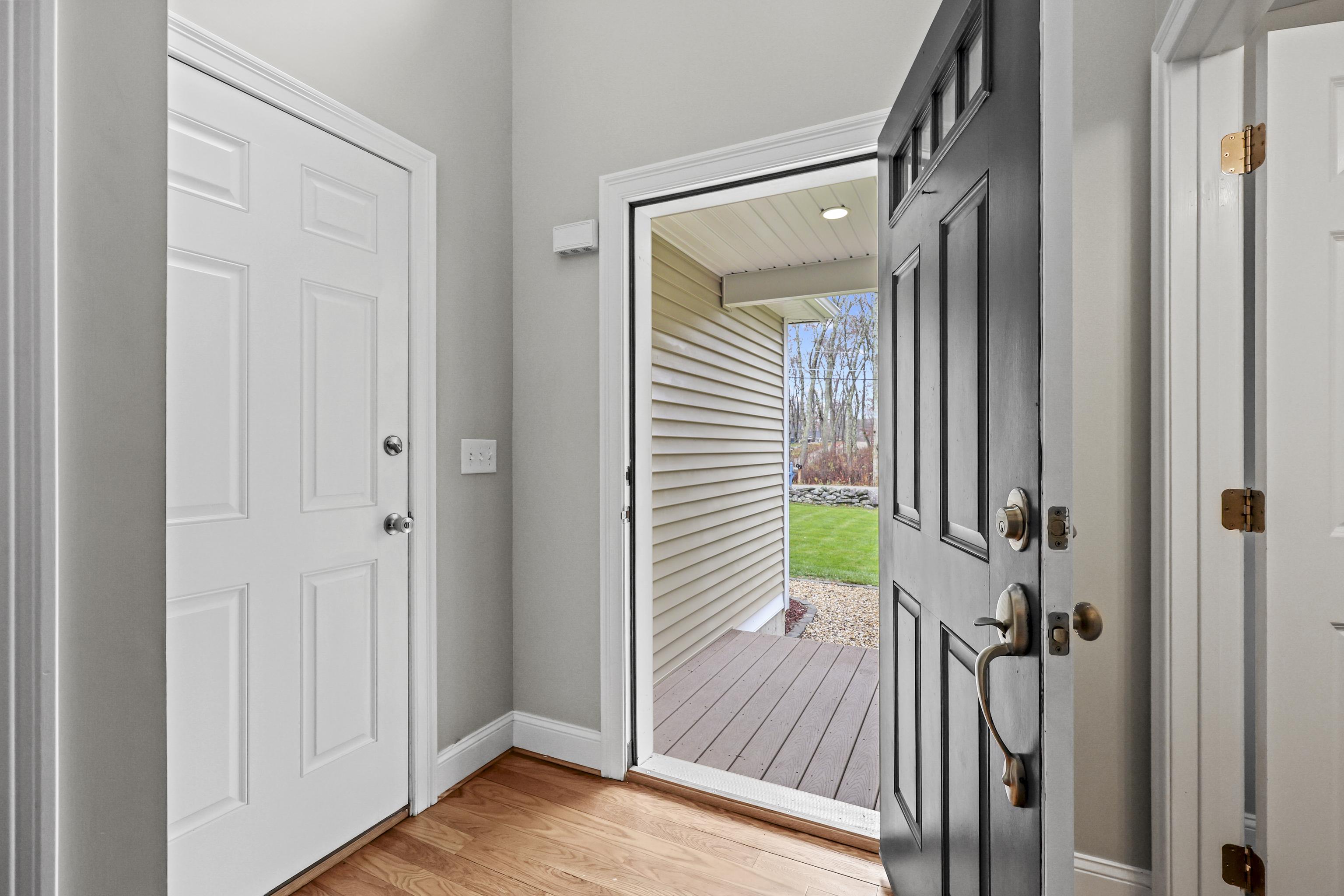 Image 4: 2-Story Foyer with access to 2-Car Attached Garage
