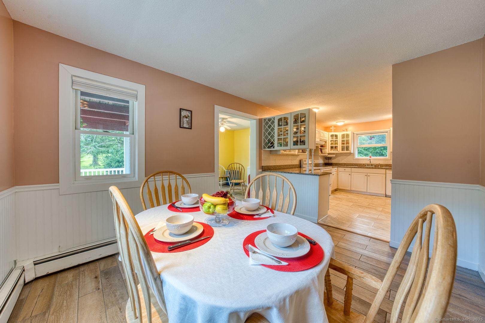 Image 3: Dining Room looking into Kitchen