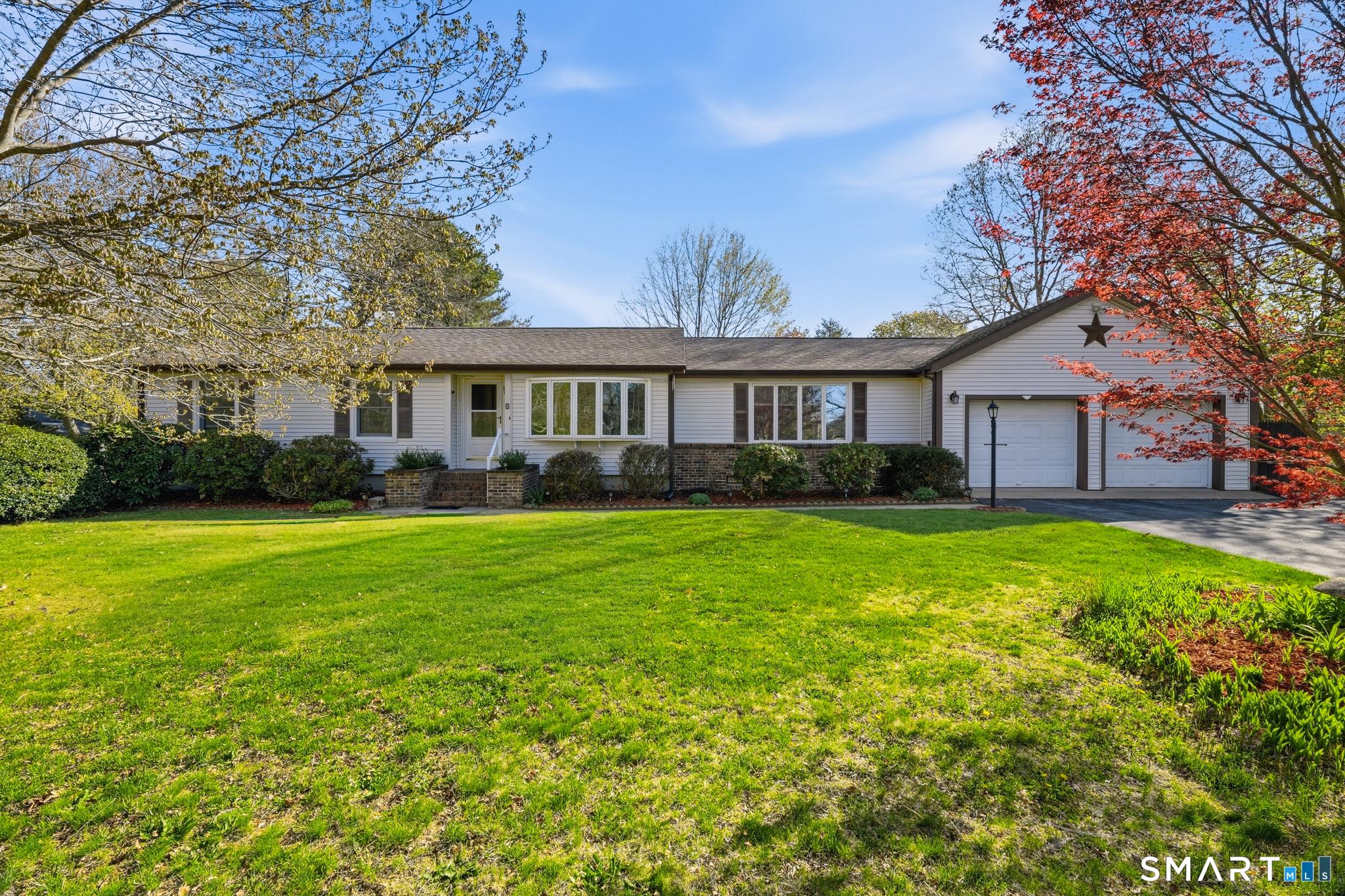 Image 1Front of House: Single level living at its brightest. This ranch is practically designed to soak up every bit of sunshine.