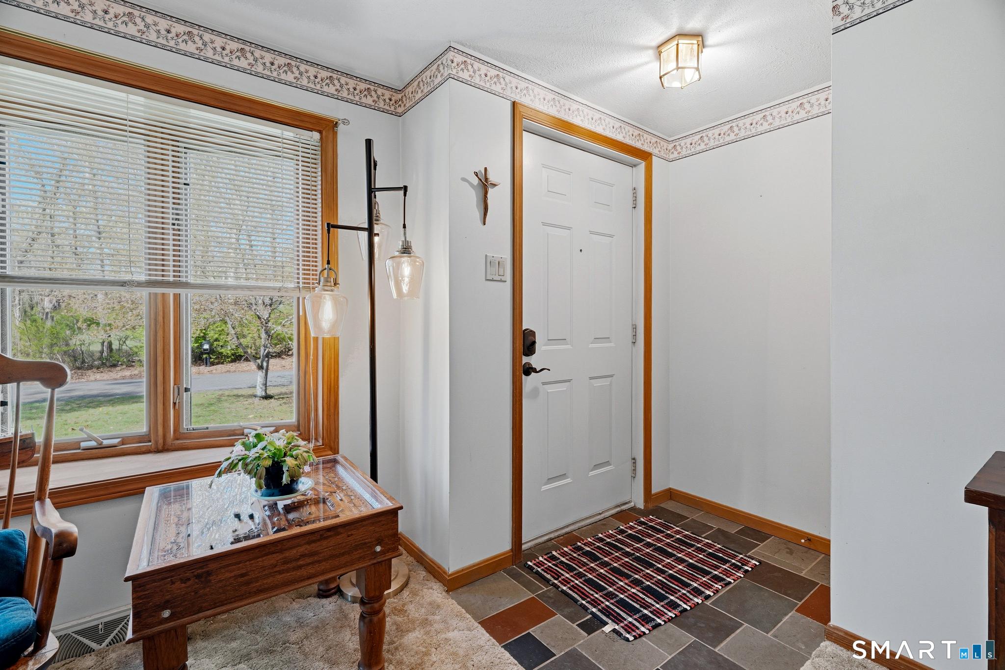 Image 4Main Entry: This entry keeps things tidy with a built in closet, perfect for staying organized on your way out the door.