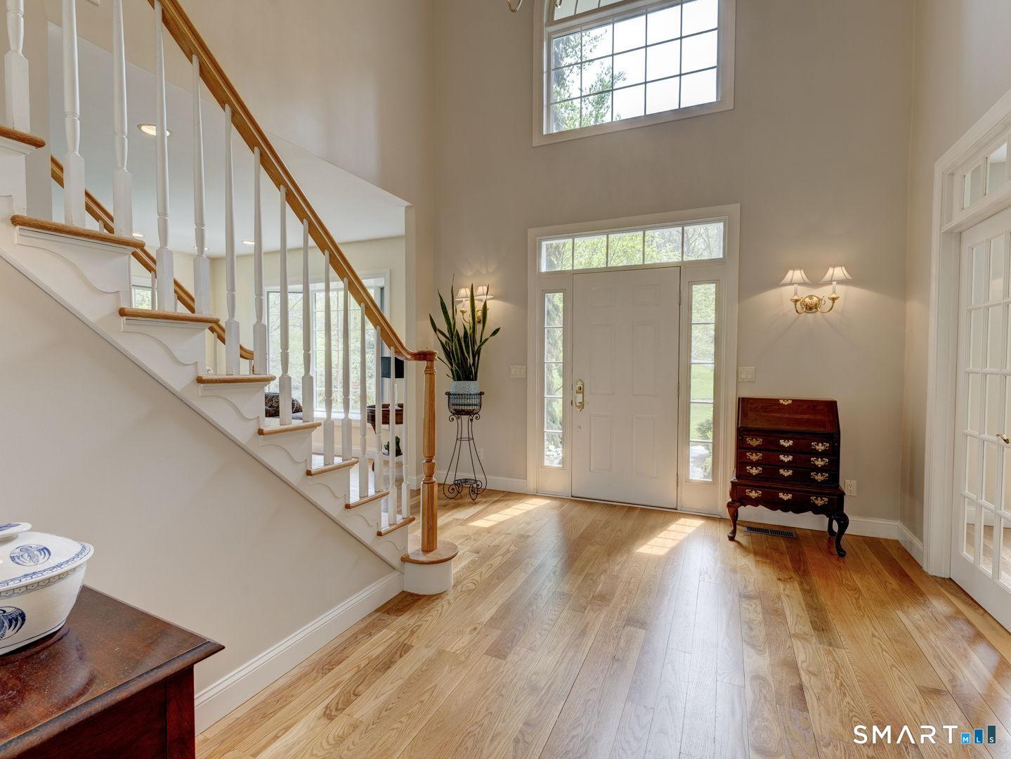 Image 4: Gleaming hardwood floors throughout!