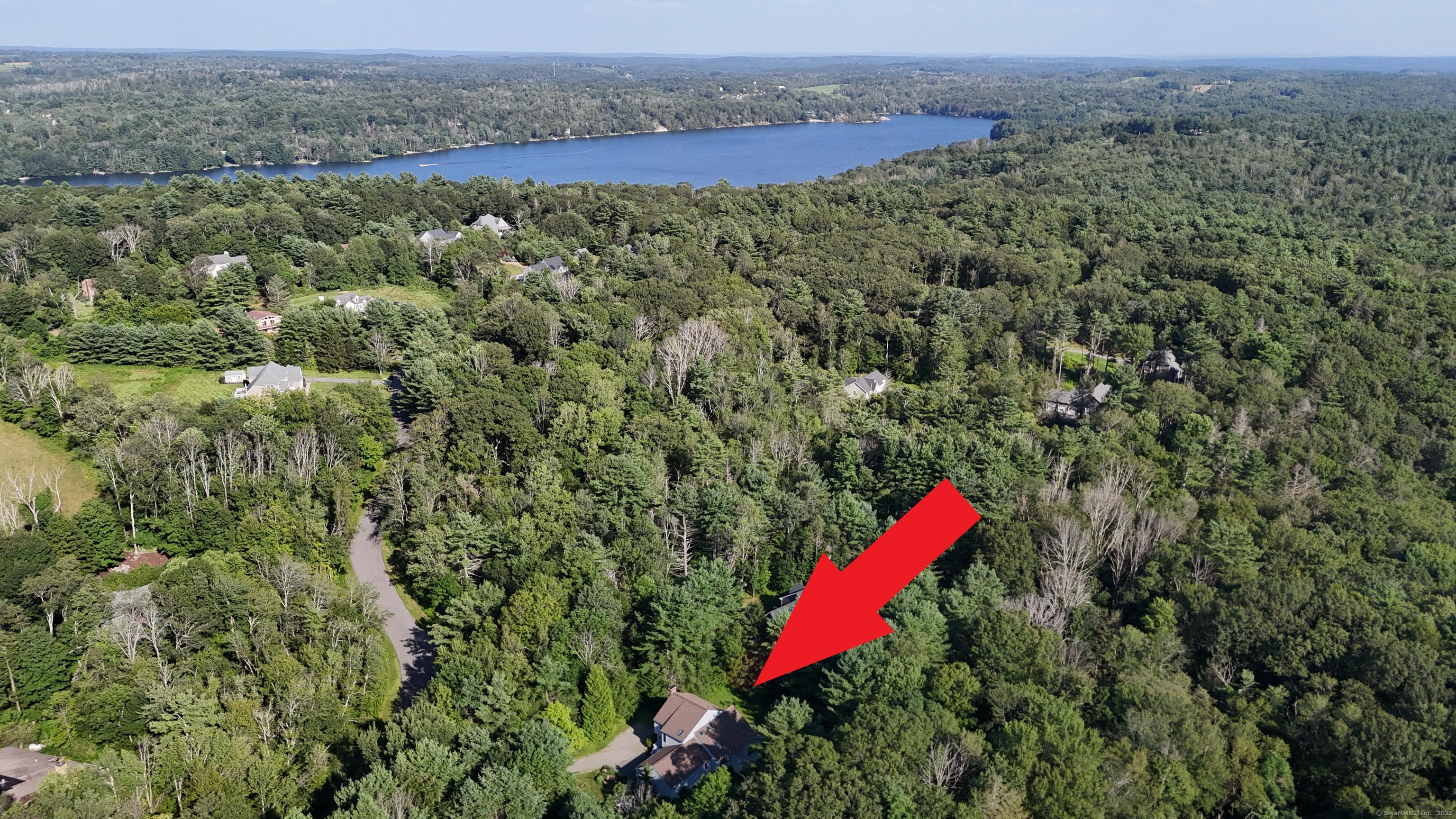 Image 2: Short walk to 1 of the 4 beaches on Woodridge Lake. Located on the West side of the lake on a cul-de-sac.