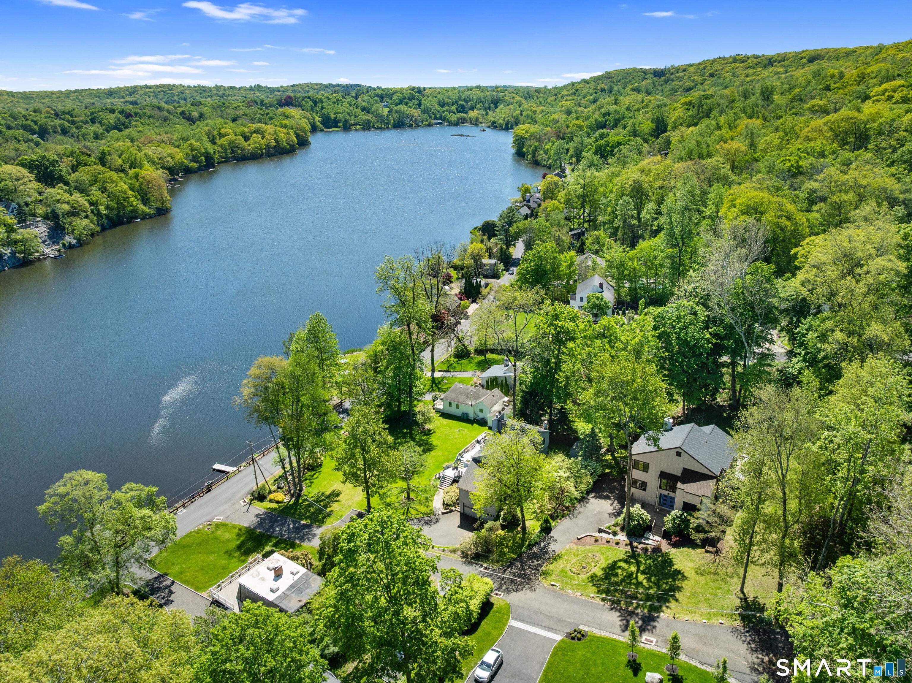 Image 2: Year-round retreat with water views & walk to lake.
