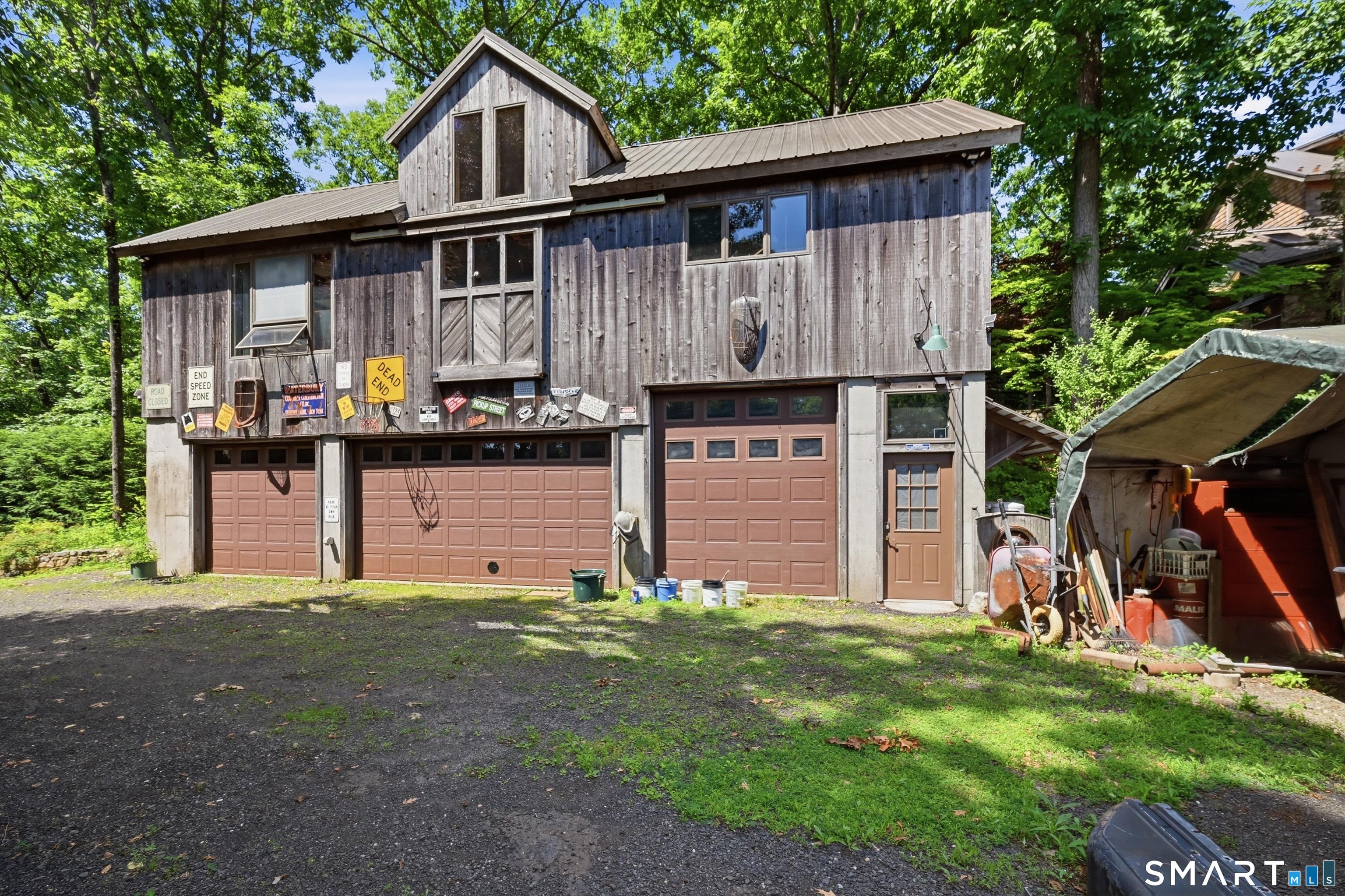 Image 2Garage: Garage level has 4 bays and extra space