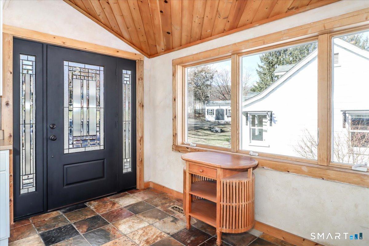 Image 4Main Entry: Nice entry into the kitchen there is also a side entry into foyer and living spaces