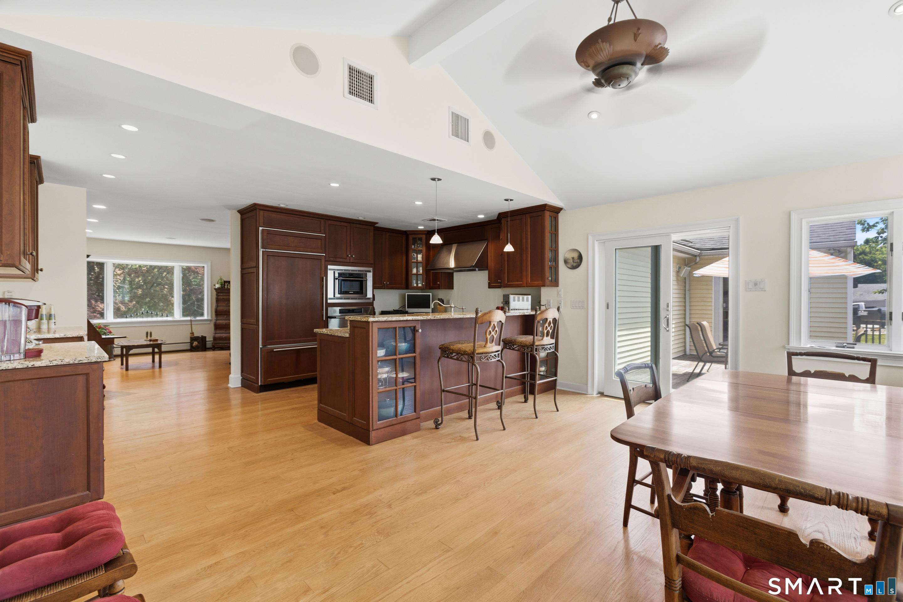 Image 3Kitchen: Fully equipped kitchen with full access to the deck and pool area.