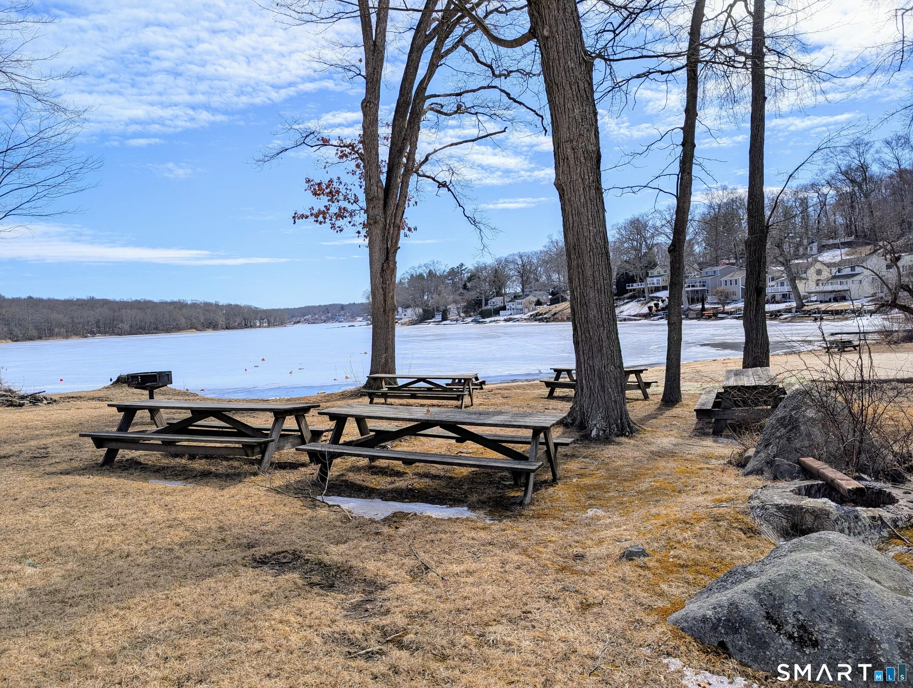 Image 4Waterfront: Waterfront Heights Lake Association has picnic tables for you to use while at Coventry Lake!