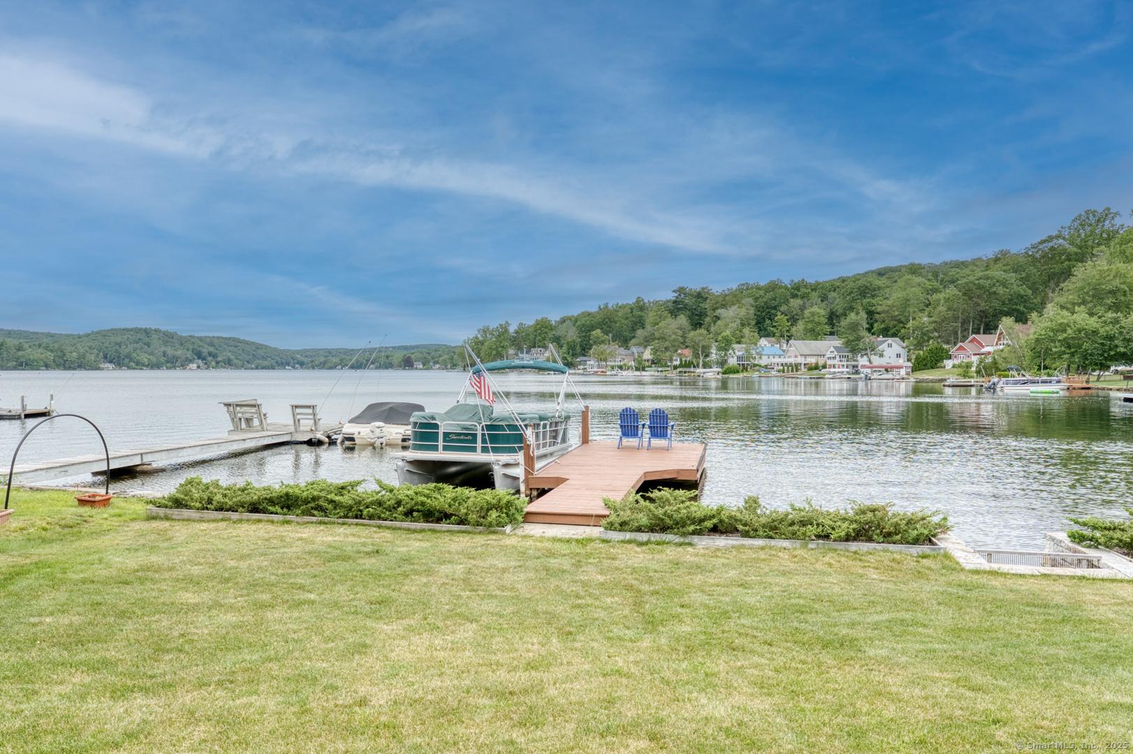 Image 1: waterfront and dock/boat
