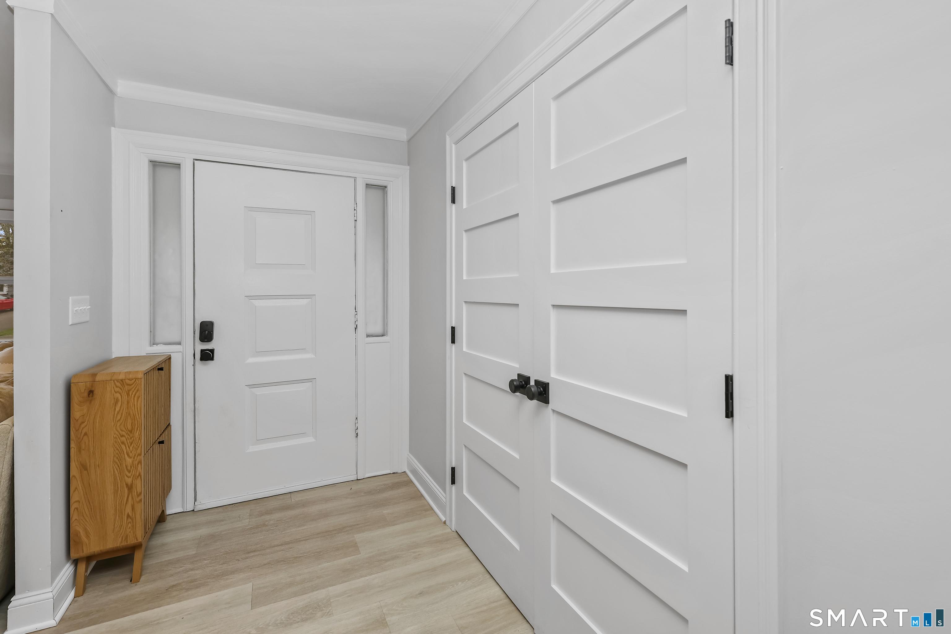 Image 3Entrance Foyer: Welcoming entry-way with large coat closet