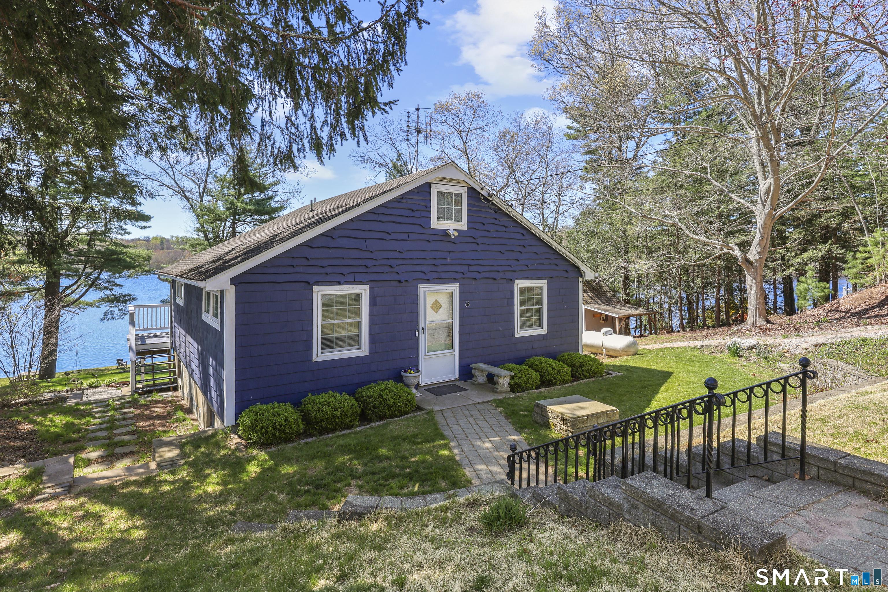 Image 2Front of House: 68 Hilltop Rd, East Haddam, CT Lakefront living at its best. .37 acres, Dock, Beach and 98' of lake frontage