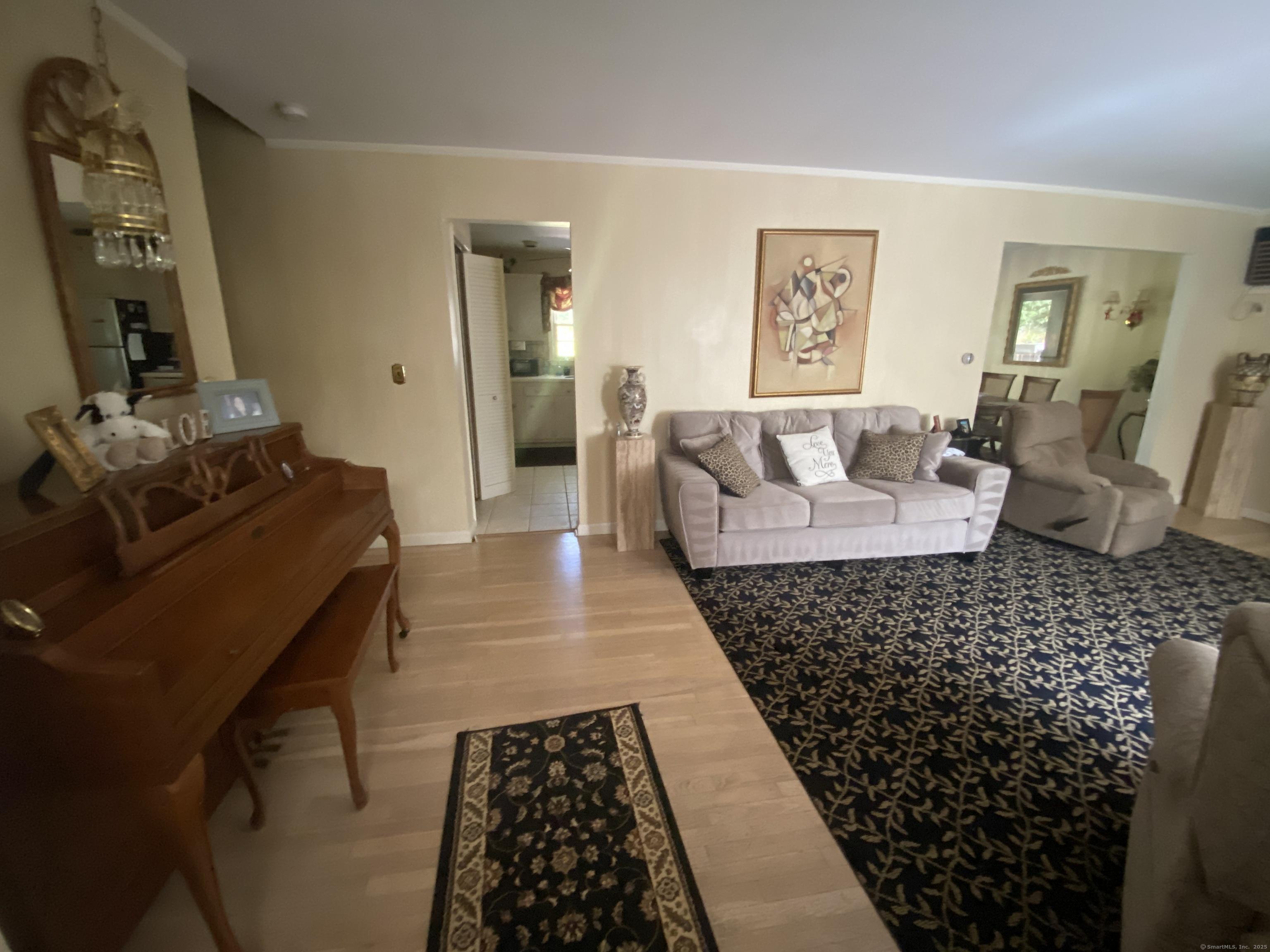 Image 4Living Room: front entrance to living room