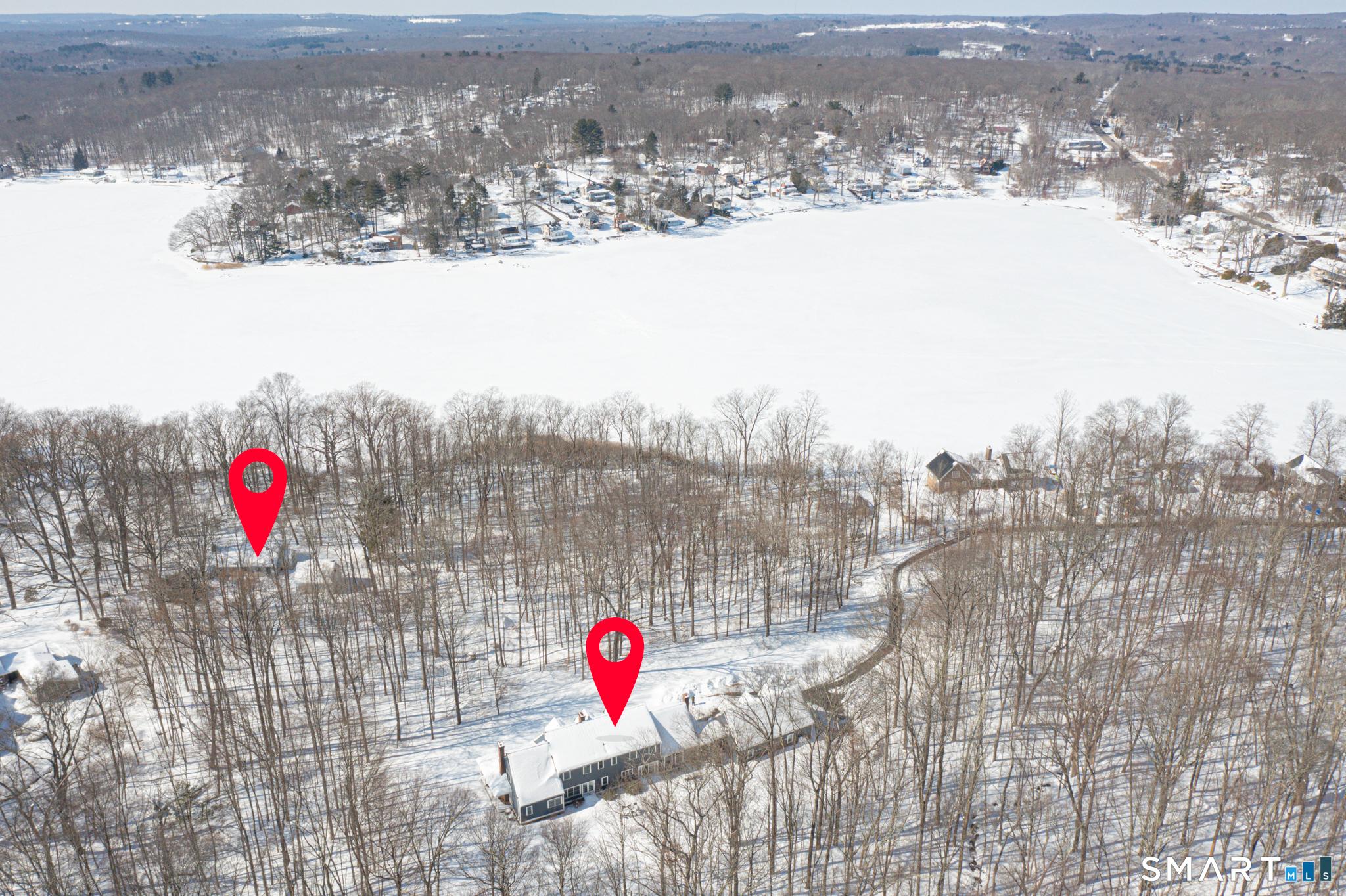 Image 3: 15 Acres (approximately) of LAKEFRONT PROPERTY- with 2 houses on COVENTRY LAKE! Main House is over 5,000sq.ft. with 4 Bedrooms, 3.5 baths, 3 car garage. Guest cottage is 1596sq.ft. with 3 bedrooms and 2 full bathrooms.