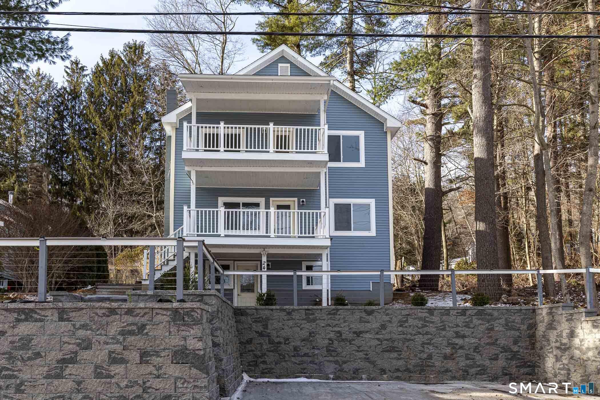 Image 2Front of House: New parking area and steps leading to front entrance