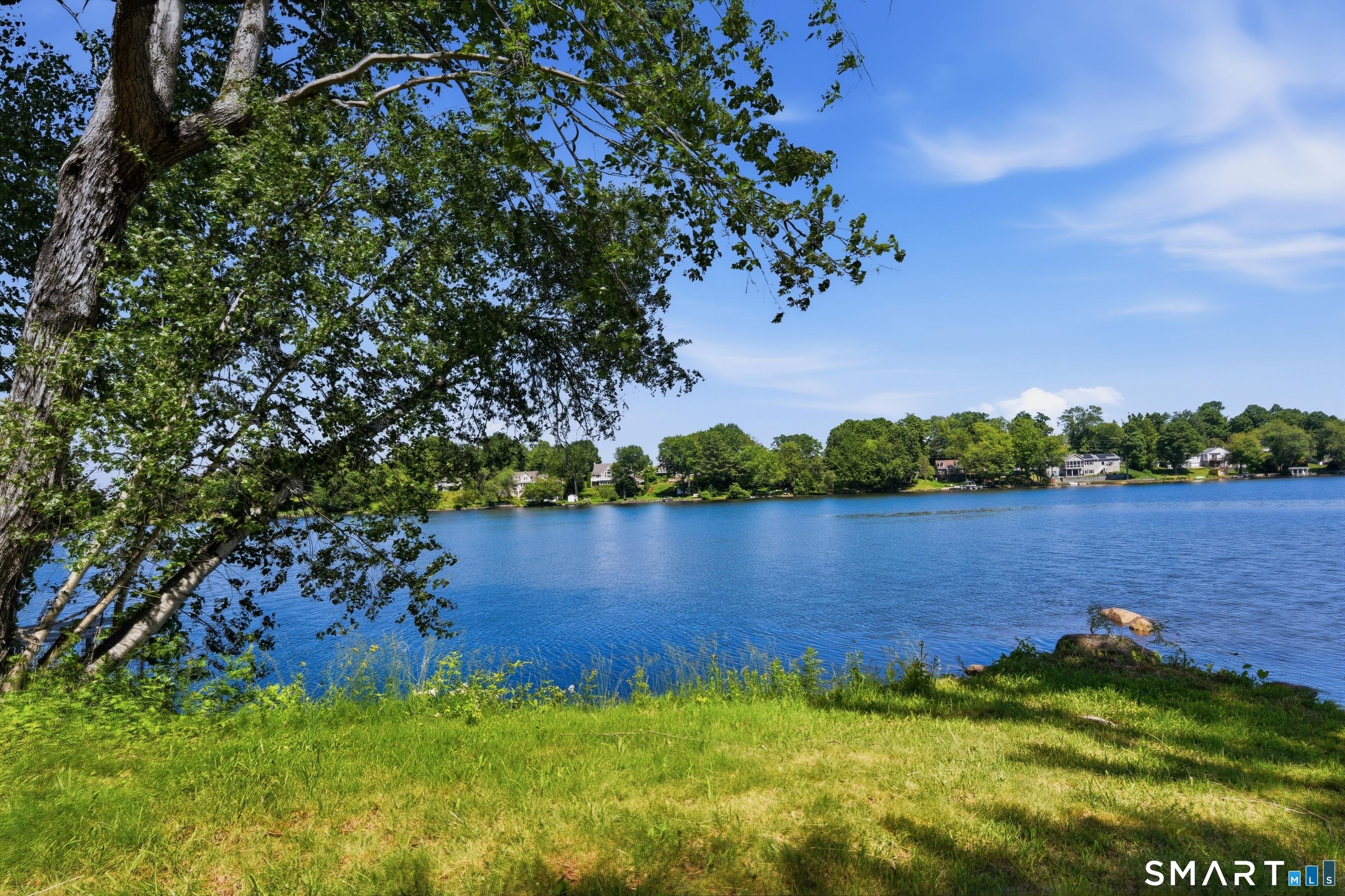 Image 3Lake: A rare highlight of the property is the deeded access to Quasset Lake directly from your own land, allowing you to enjoy lake living year-round.