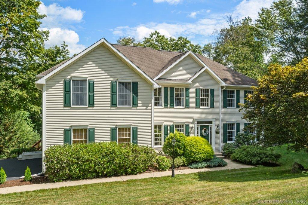 Image 2Front of House: Welcome to 105 Lake Ridge Rd!