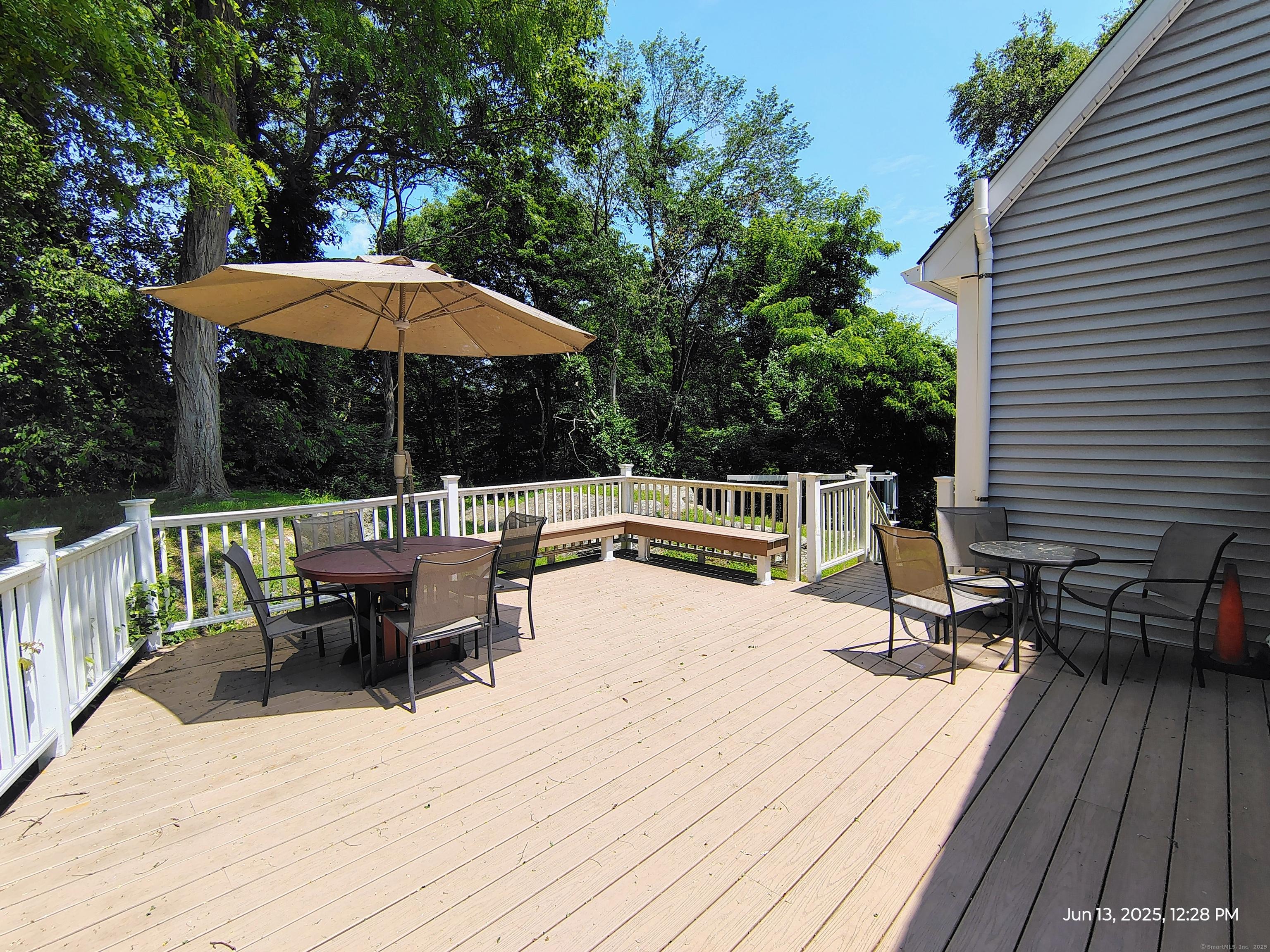Image 2: Large back deck with built in benches