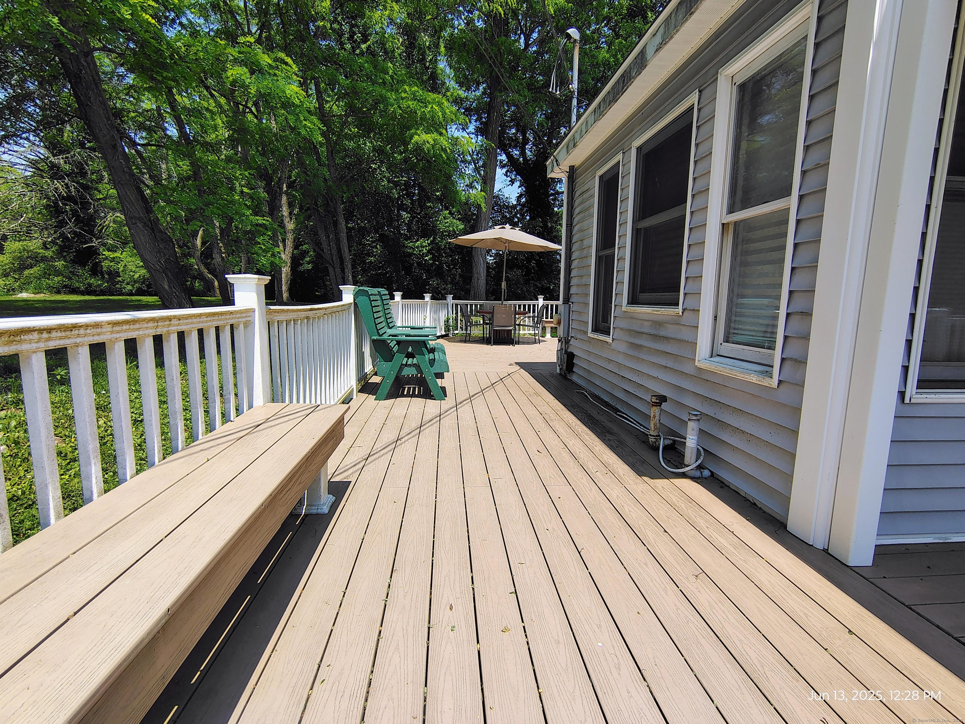 Image 3: Side deck with built in bench