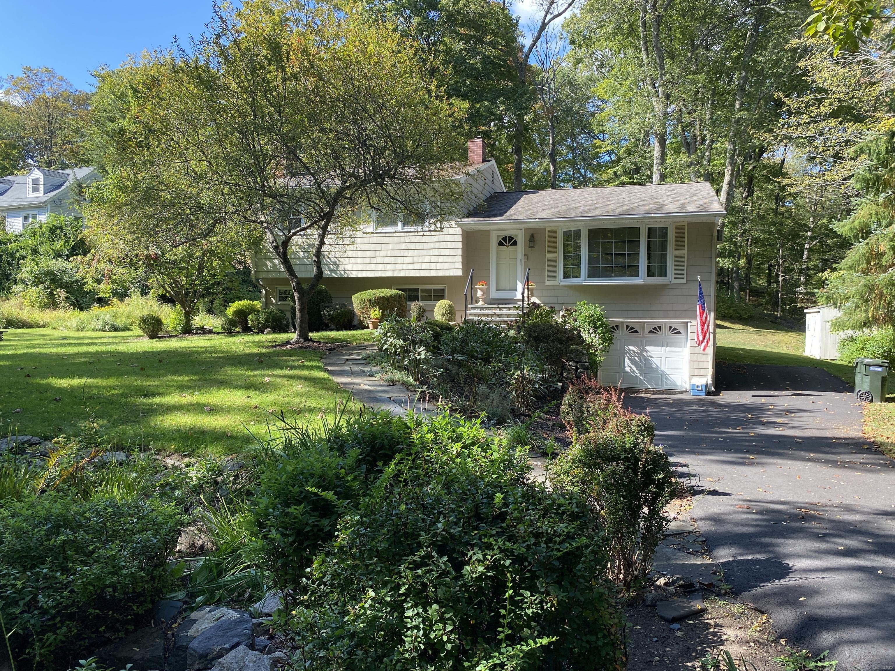 Image 2Front of House: Front yard with walkway to the house