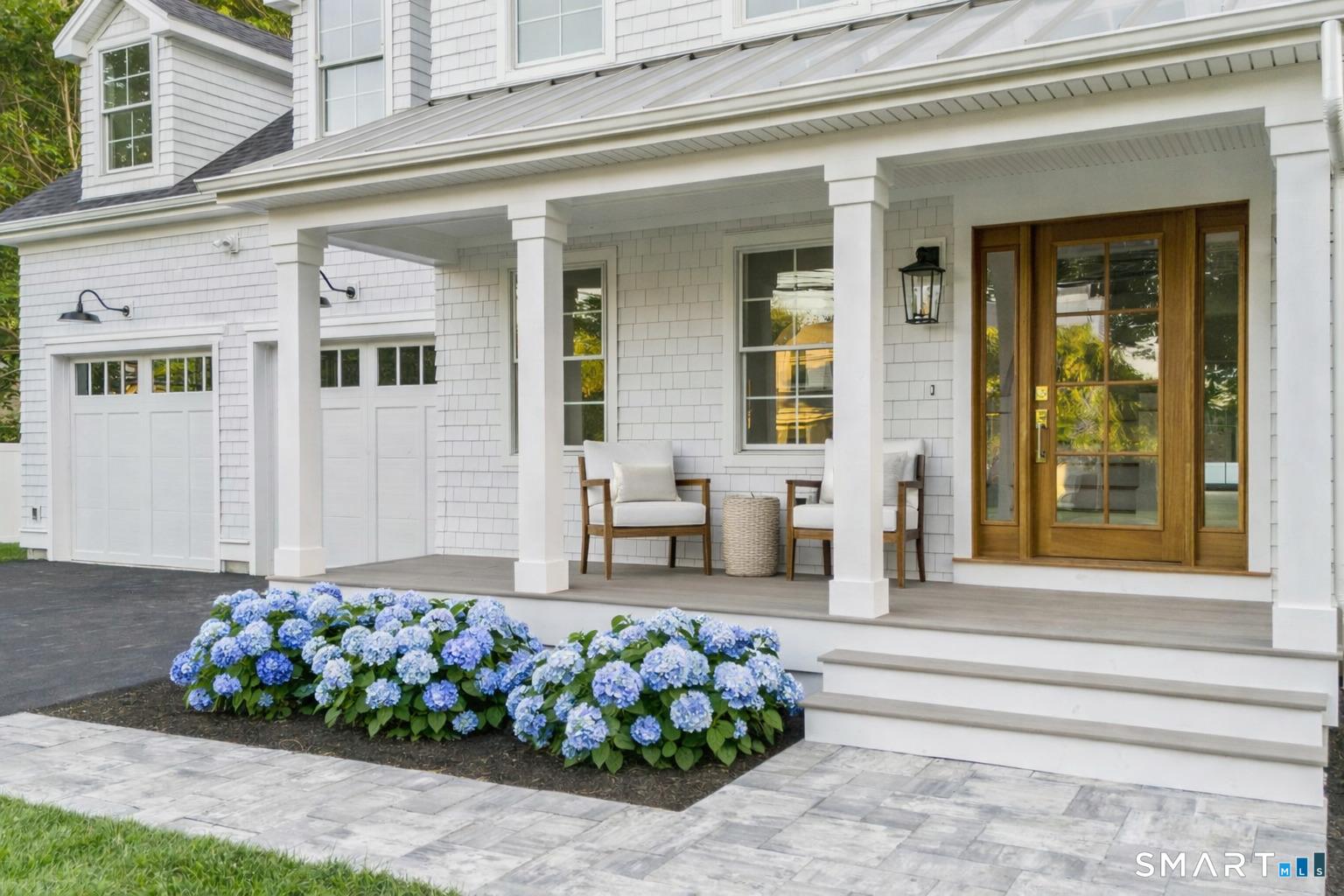 Image 1Front of House: Welcome to a neighborhood where friendly waves, people riding bikes, and a genuine sense of community are part of everyday life.