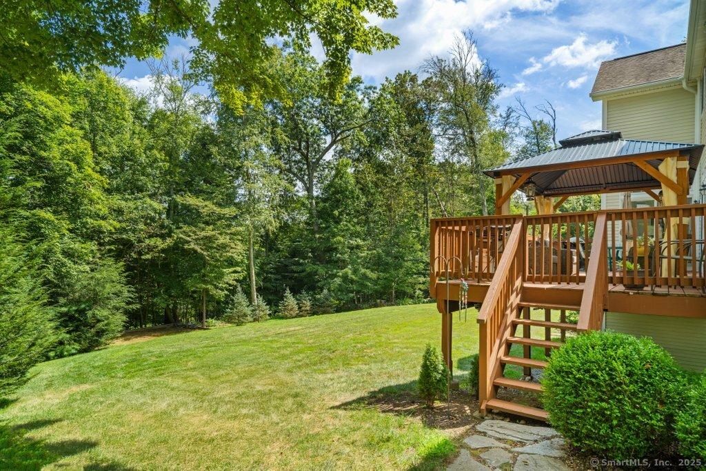 Image 3Back of House: New Pergola atop a deck overlooking the yard