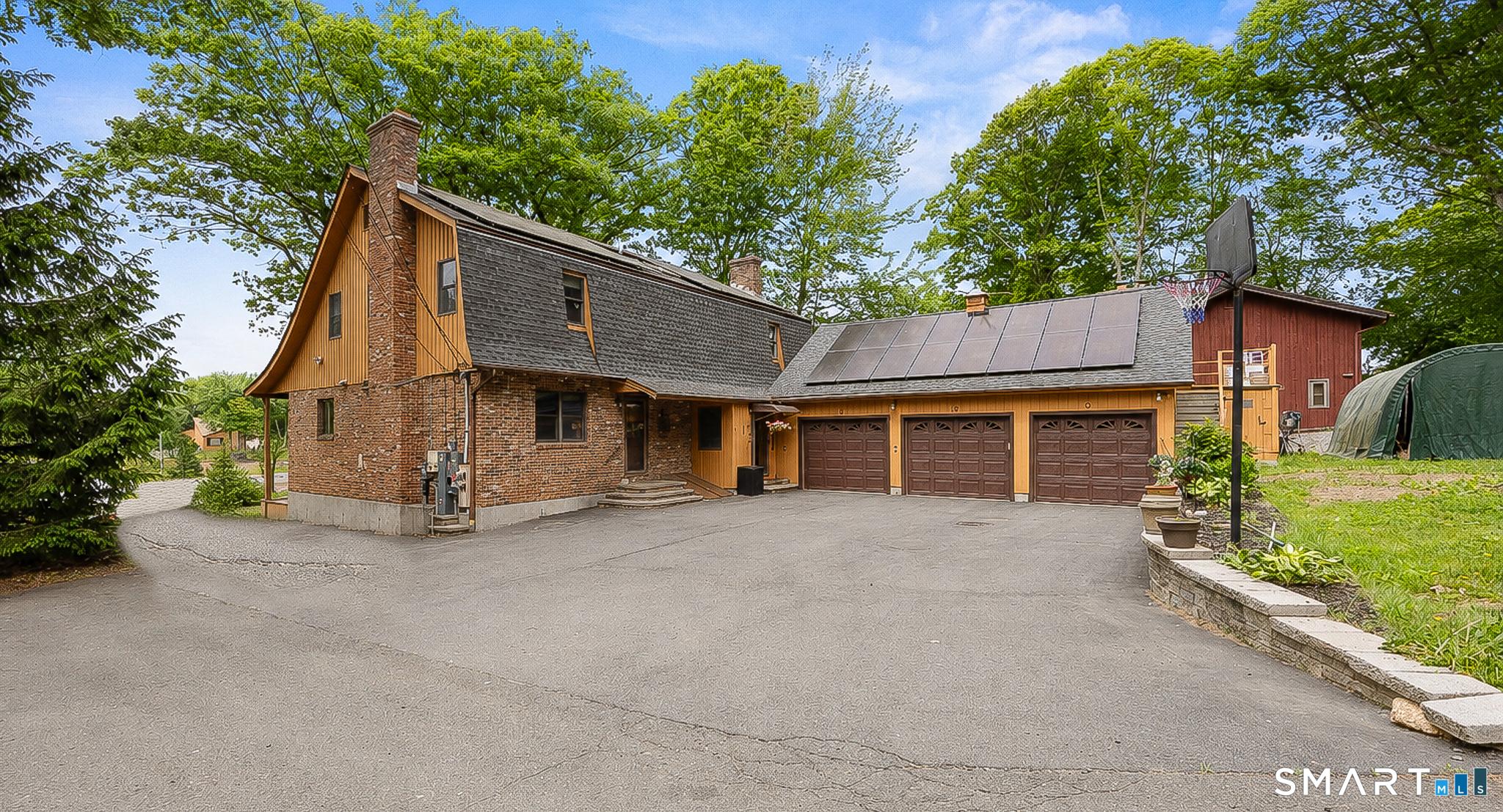 Image 2: Street-side view. 3-car garage. Plenty of parking.