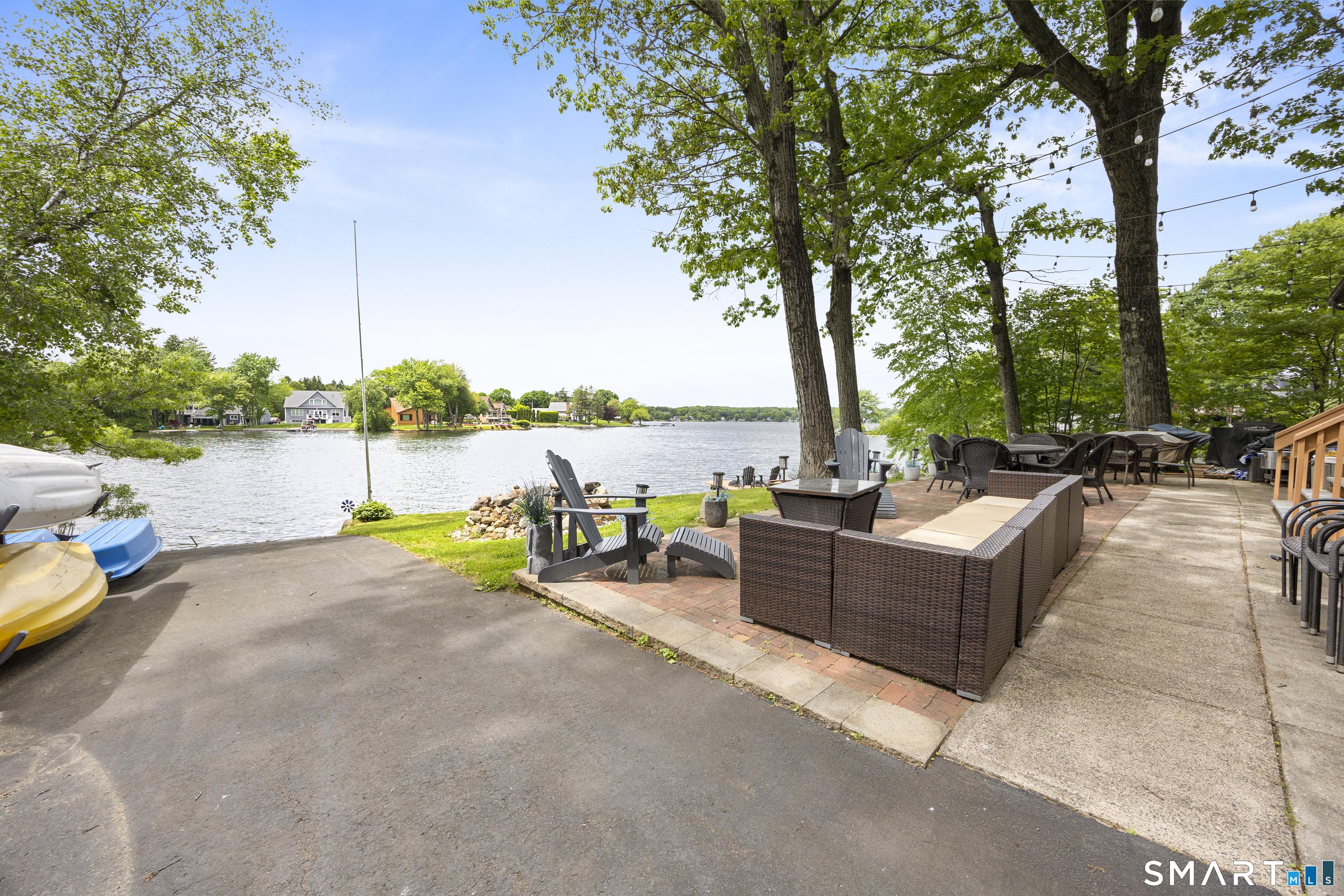 Image 3: Beautiful views. Expansive patio + deck