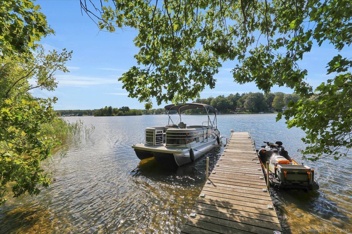 Image 1Lake: With over 700 feet of lake frontage, there's plenty of room for your dock, boats, jet skis and lake toys!